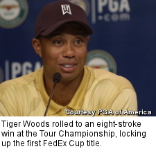 Tiger Woods rolled to an eight-stroke win at the Tour Championship, locking up the first FedEx Cup title.
