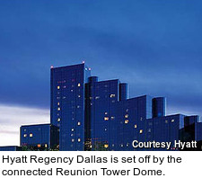Hyatt Regency Dallas is set off by the connected Reunion Tower Dome.
