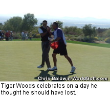 Tiger Woods celebrates on a day he thought he should have lost.