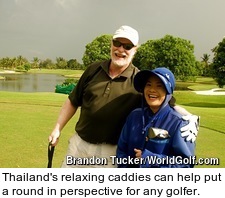 Golfer and Thai caddie