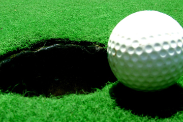 Golf ball near hole