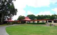 CC of Silver Springs Shores: putting green & clubhouse